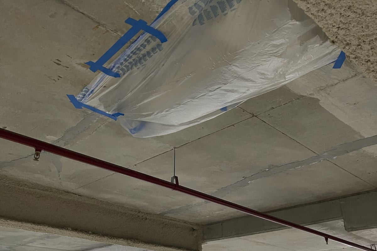 Carbon fibre mesh reinforcement application on structural walls