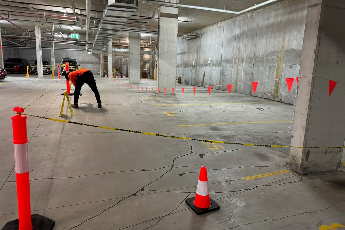 High-strength epoxy injection creating structural bond in concrete slab